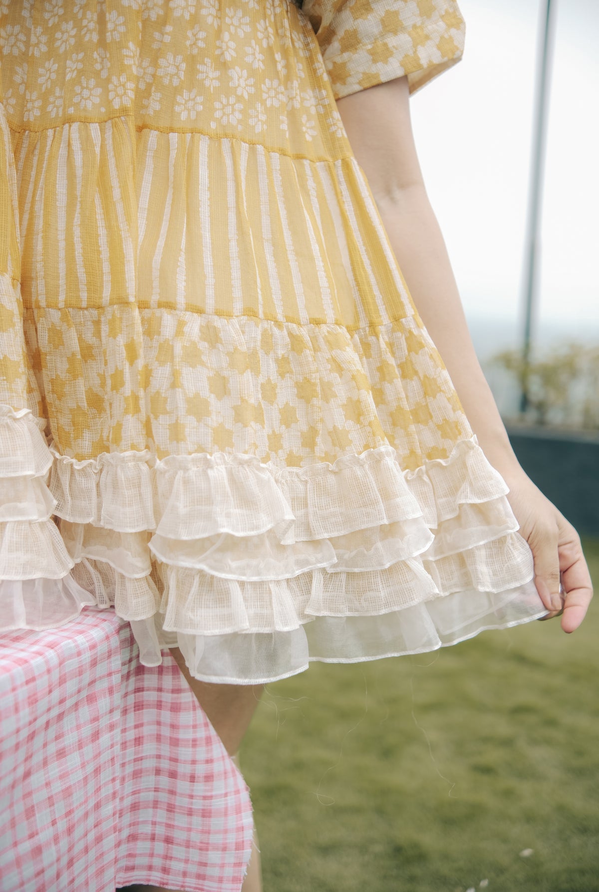 Yellow ruffled hemline tunic
