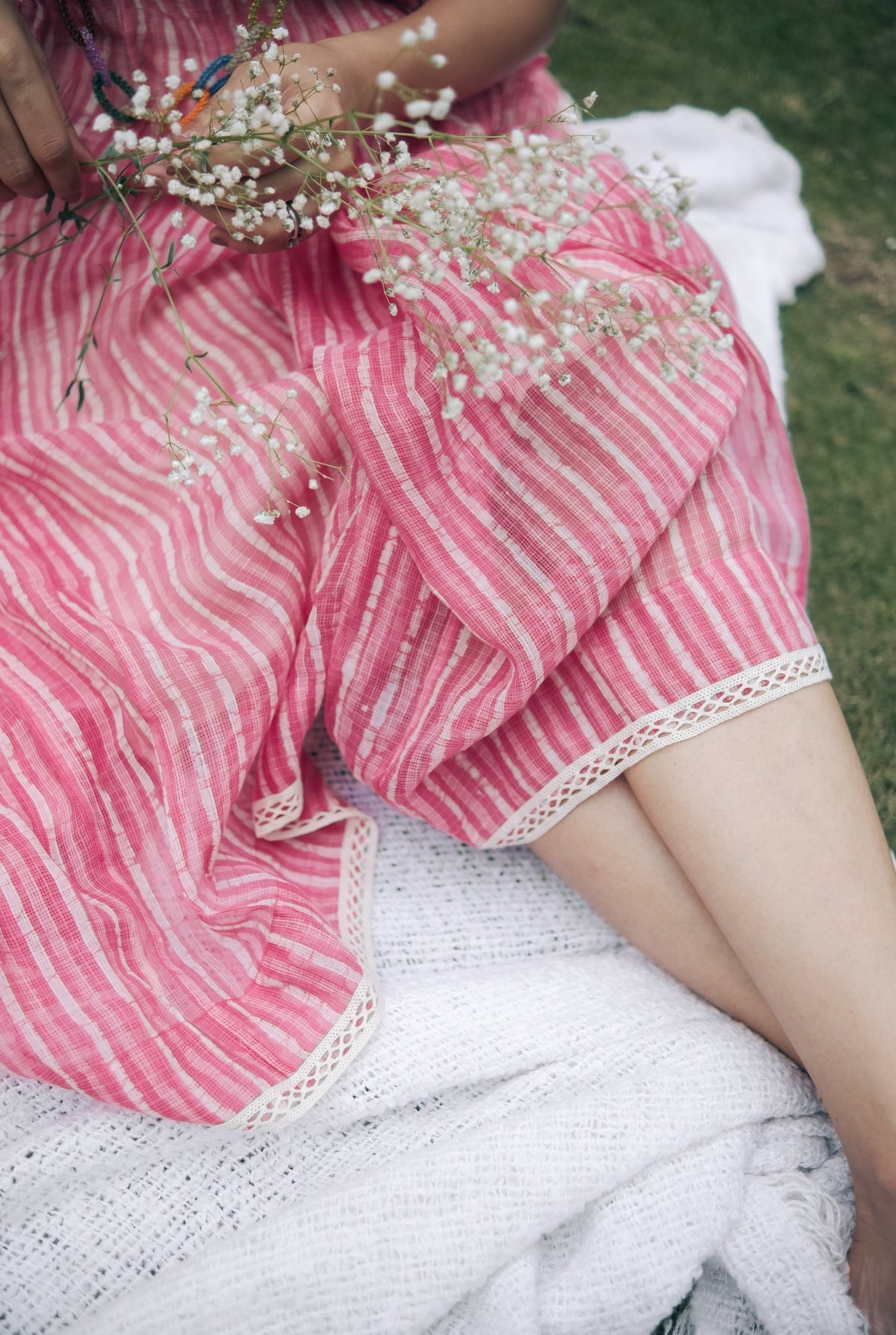 Pink sleeveless pleated yoke dress