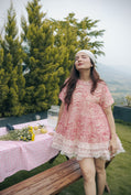 Pink ruffled hemline tunic