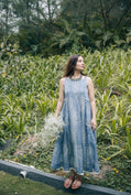 Blue sleeveless pleated yoke dress