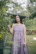 Purple sleeveless pleated yoke dress