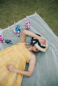 Yellow smocked tube dress